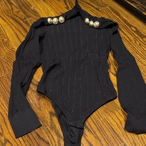 Black Ribbed Long-Sleeve Bodysuit with Decorative Buttons
